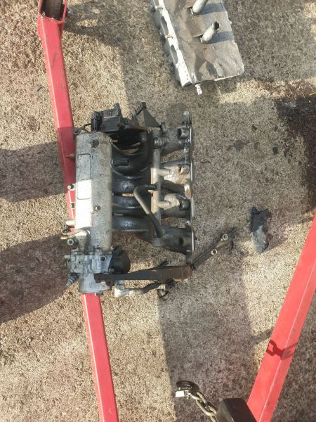 File:4G92 DOHC MIVEC gen1 intake manifold with TB from top.jpg